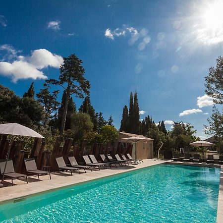 Les Cabanes Dans Les Bois Logis Hotel Villedubert Exteriör bild