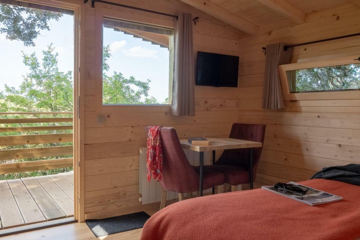 Les Cabanes Dans Les Bois Logis Hotel Villedubert Exteriör bild